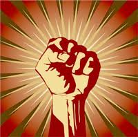 Photo of fist clenched as symbol for activist. J.P. Rogers blog at the ODD Group.Picture