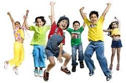 Photo of children dancing.